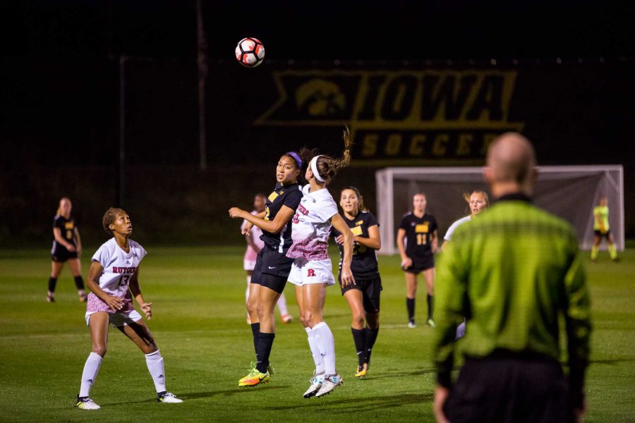 Players try and head the ball during the Iowa/Rutgers soccer game on Thursday, Oct. 5, 2017. Iowa won the match 1-0. (David Harmantas/The Daily Iowan)