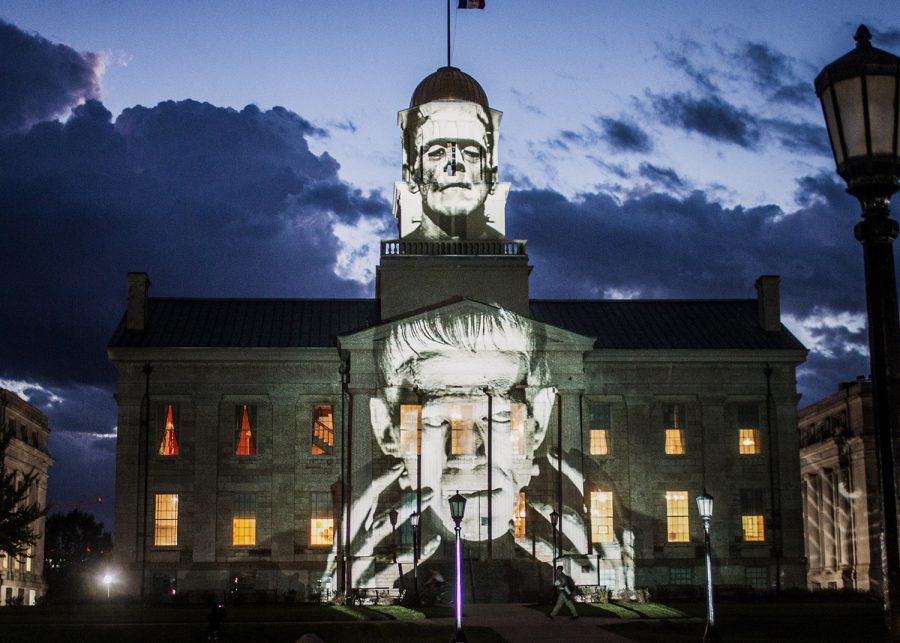 The Old Capitol building is lit up with a Frankenstein light display on Wednesday, Oct. 3, 2018. International light artist Gerry Hofstetter chose the building as a backdrop to feature artwork included in his “Light Art Grand Tour USA.”