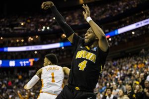Iowa guard Isaiah Moss shoots a three-pointer during the NCAA game against Tennessee at Nationwide Arena on Sunday, March 24, 2019. The Volunteers defeated the Hawkeyes 83-77 in overtime.