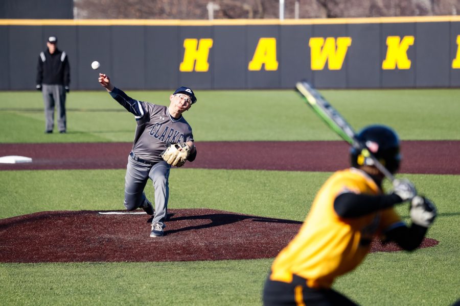 Clarke pitcher Tsubasa Maruyama pitches the ball to Iowa's Brendan Sher during a baseball game against the University of Iowa on Sunday, Mar. 31, 2019. The Hawkeyes defeated the Pride 3-2. 