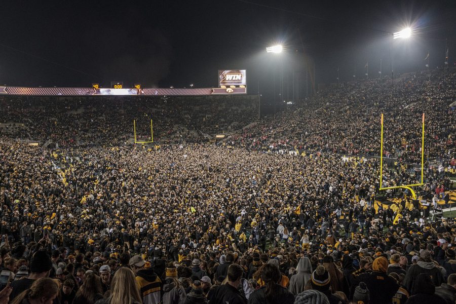 Fans rush the stadium after the Iowa vs. Ohio State game at Kinnick Stadium on Nov. 4, 2017. Iowa defeated Ohio State 55-24. 