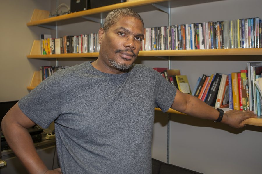 Associate Professor Christopher Harris poses for a photo in his office in the Alder Journalism Building on Tuesday, October 22nd, 2019. Harris is the head of film &amp; video production of the University of Iowa department of cinematic arts and his documentary *still/here* was shown at the 2019 Locarno film festival in Switzerland. 