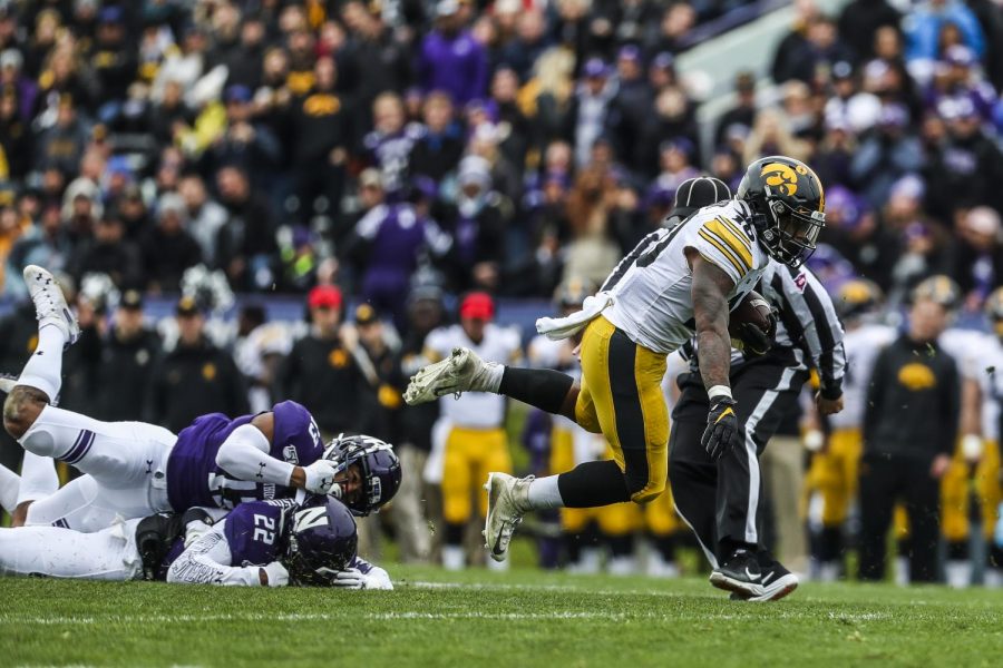 Iowa running back Mekhi Sargent carries the ball during the game against Northwestern at Ryan Field on Saturday, October 26, 2019. The Hawkeyes lead the Wildcats 10-0 at half.