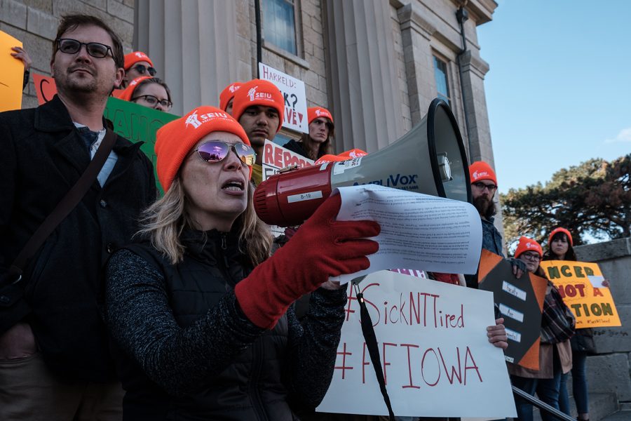 Associate Professor of Instruction for the Rhetoric Department Megan Knight reads a statement during a protest for sick leave time at the Old Capitol Building on Tuesday, October 29, 2019. Faculty Forward would like to establish a sick leave bank for non-tenure track faculty. The University of Iowa’s Catastrophic Leave policy covers two percent of faculty members in the College of Liberal Arts and Sciences, most of the uncovered faculty are non-tenure track.