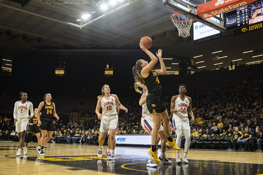 Iowa forward Amanda Ollinger goes to the rim during a womenÕs basketball match between Iowa and Clemson at Carver-Hawkeye Arena on Wednesday, Dec. 4, 2019. The Hawkeyes defeated the Tigers, 74-60. (Shivansh Ahuja/The Daily Iowan)