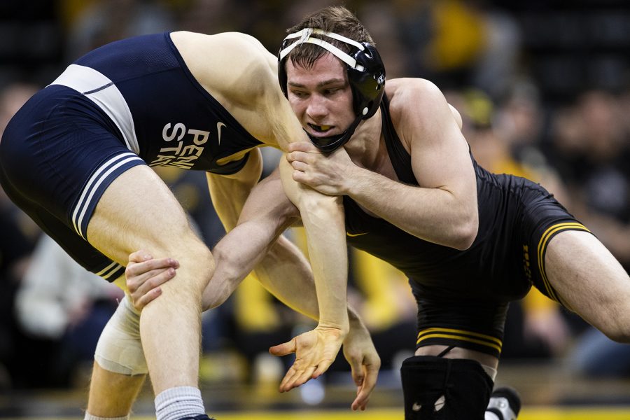 Iowa's Spencer Lee wrestles Penn State's Brandon Meredith during a wrestling dual meet between No. 1 Iowa and No. 2 Penn State at Carver-Hawkeye Arena on Friday, Jan. 31, 2020.