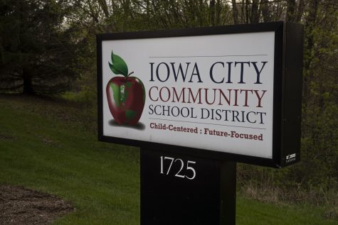 A sign for the Iowa City Community School District is seen outside the district's administration building on Tuesday, April 28.