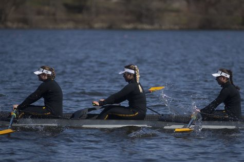 Iowa's second varsity crew rows back after losing to Wisconsin by 6.07 seconds in the first session of a women's rowing meet on Lake MacBride on Saturday April 13, 2019. Iowa won 3 out of 12 races with the varsity 8 crew winning both races for the day. 