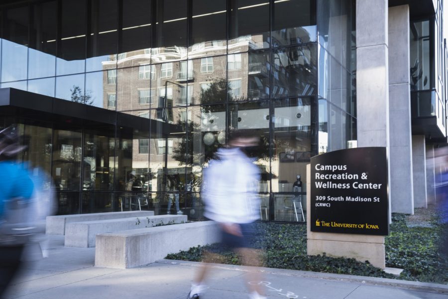 Gym goers on the way and leaving the UI Campus Recreation and Wellness Center on Thursday, Oct. 15, 2020. 