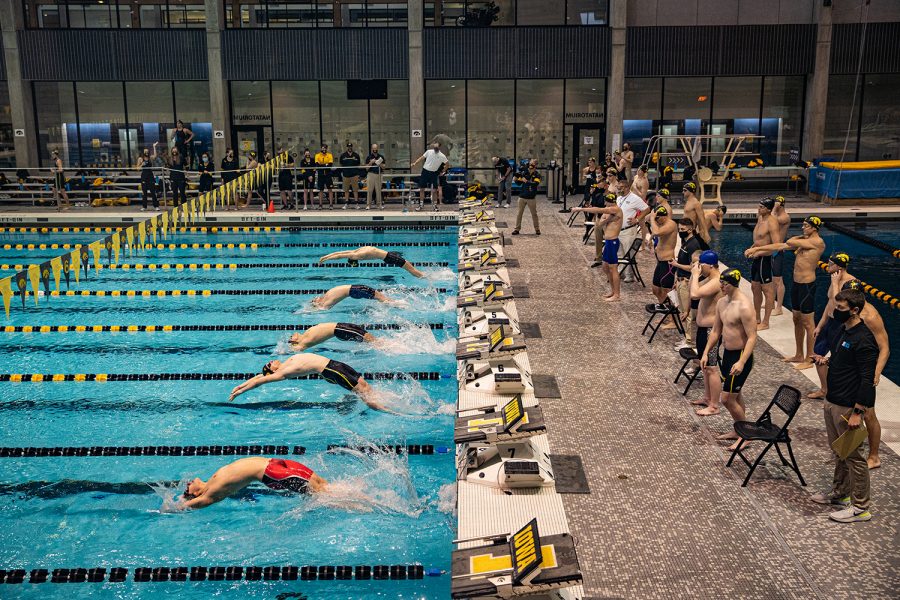 The men's medley relay is underway during a swim meet at the Campus Recreation and Wellness Center on Saturday, Jan. 16, 2021. The women's team hosted Nebraska while the men's team had an intrasquad scrimmage. 