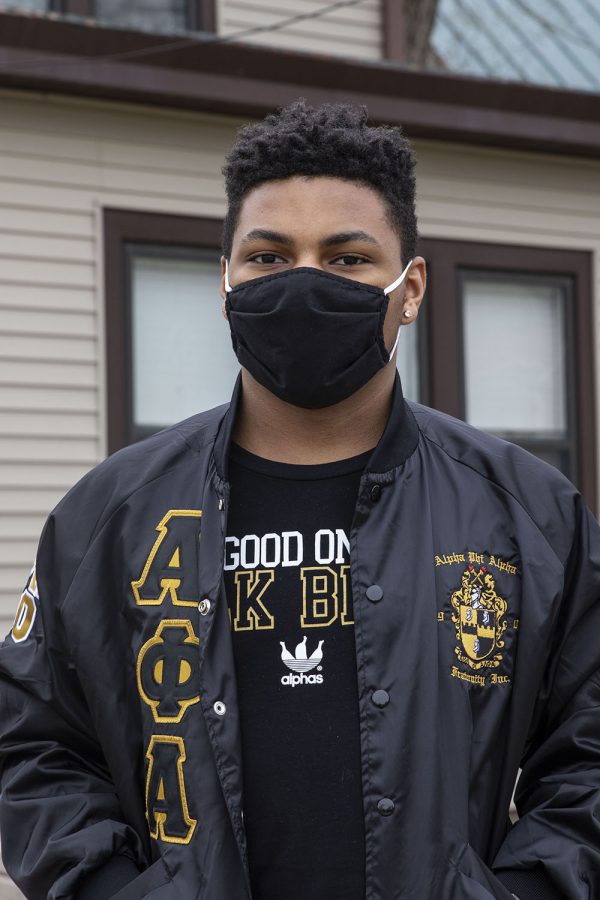Michael Warner-Craft poses for a portrait outside of the Afro-American Cultural House on March 12, 2021. 