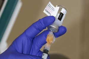 Moderna COVID-19 vaccine is drawn up on Tuesday, Dec. 22, 2020.