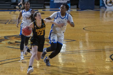Iowa guard Caitlin Clark dribbles toward the basket during the second round of the NCAA women's basketball championship against No. 4 Kentucky on Tuesday, March 23, 2021 at the Bill Greehey Arena at Saint Mary's University in San Antonio, Texas. The Hawkeyes defeated the Wildcats, 86-72. No. 5 Iowa will go on to play the winner of tonight's 8 p.m. game between No. 1 UConn and No. 8 Syracuse in the Sweet Sixteen starting on Saturday.