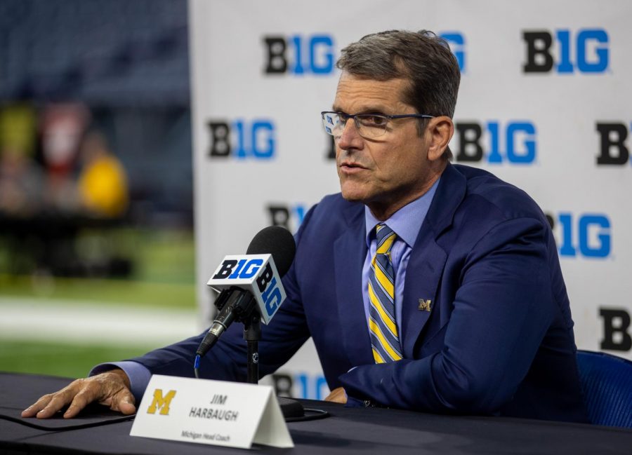 Michigan head football coach Jim Harbaugh speaks during Day 1 of the 2021 Big Ten Media Days at Lucas Oil Stadium in Indianapolis, Indiana, on July 22.