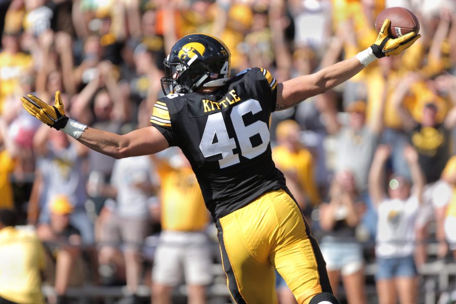 Iowa tight end George Kittle celebrates after his touchdown during the Iowa-North Texas game in Kinnick Stadium on Saturday, Sept. 26, 2015. The Hawkeyes defeated the Mean Green, 62-16.