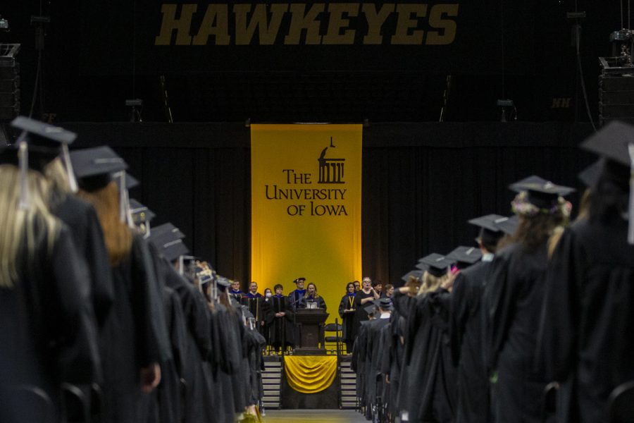 Faculty Marshal Elizabeth Walker speaks during the University of Iowa's Commencement Ceremony for College of Liberal Arts and Sciences spring 2022 graduates at Carver-Hawkeye Arena on Saturday, May 14, 2022.