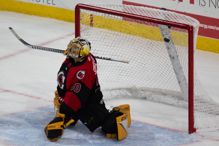 The puck flies into the goal to score the winning point during a hockey game between the Iowa Heartlanders and the Cincinnati Cyclones at Xtream Arena in Coralville on Saturday Nov. 26, 2022.  The Heartlanders defeated the Cyclones, 4-3.