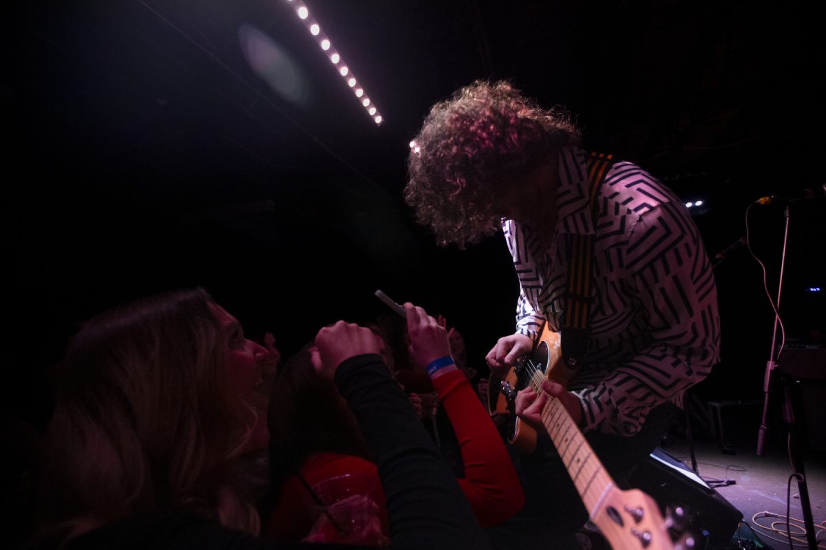 The lead guitarist for 28 Days Later interacts with crowd during Battle of the Bands at Gabe’s in Iowa City on Saturday, Feb. 17, 2024. 