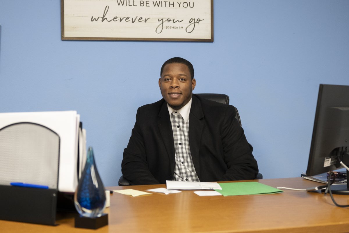 Frederick Newell poses for a portrait in his office in Iowa City on Thursday, April 18, 2024. Newell is the founder of a non-profit organization called Dream City.