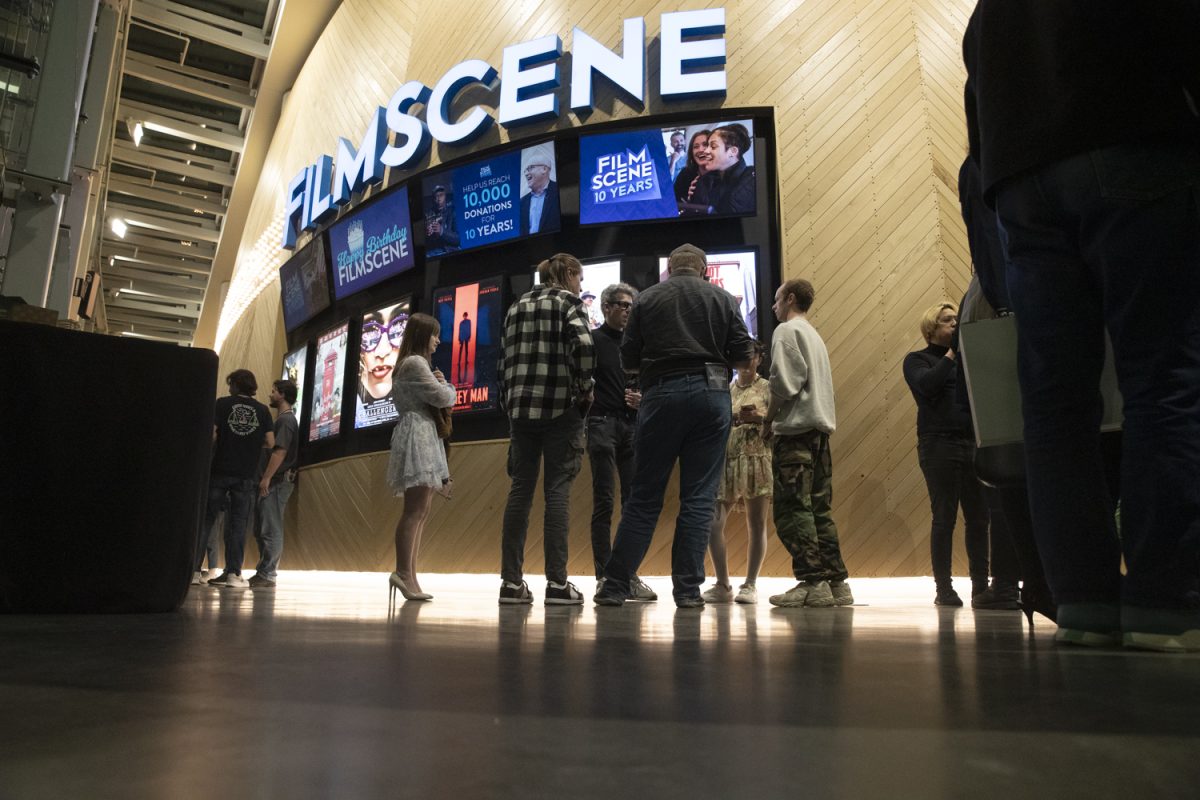 A crowd gathers at FilmScene during an ICDOCS afterparty at the Chauncey in Iowa City on Friday, April 26, 2024.