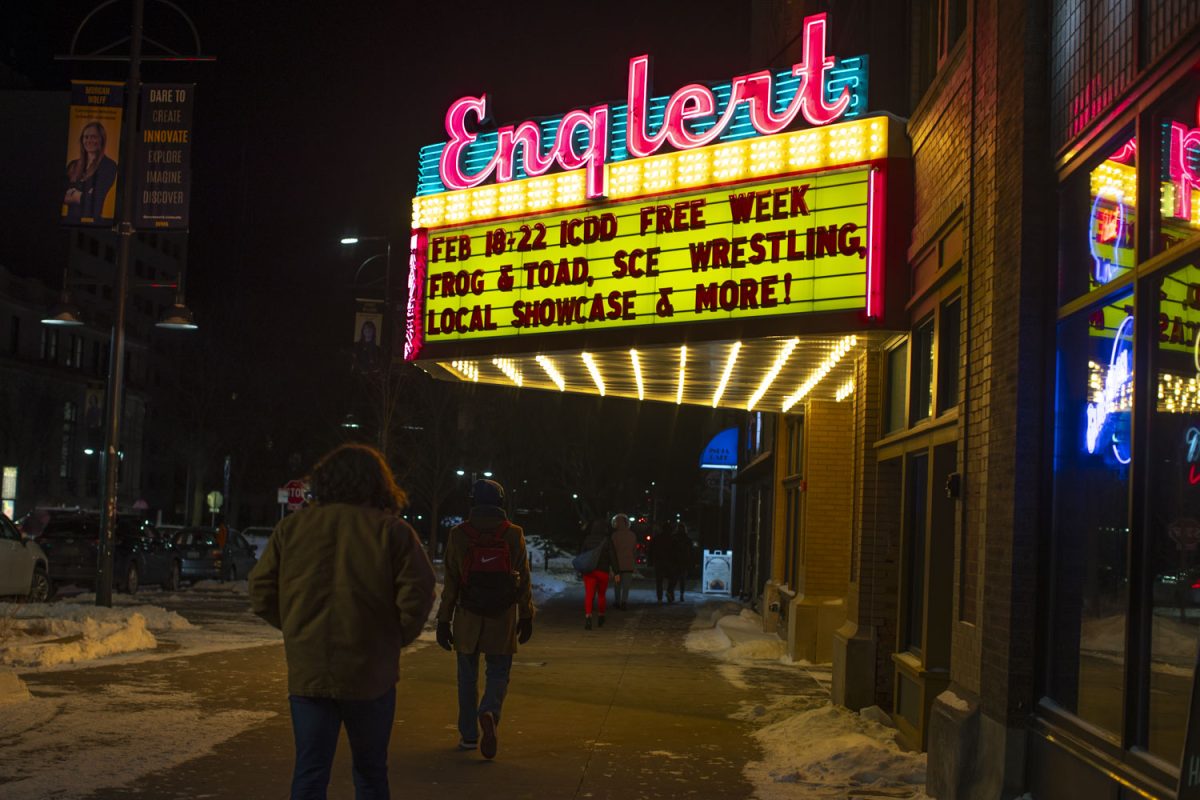 The marquee for the X Marks the Arts Free Week of events is hung up on the Englert Theater in Iowa City on Friday, Feb. 13, 2025. Free week included events such as pro wrestling and musical performances.