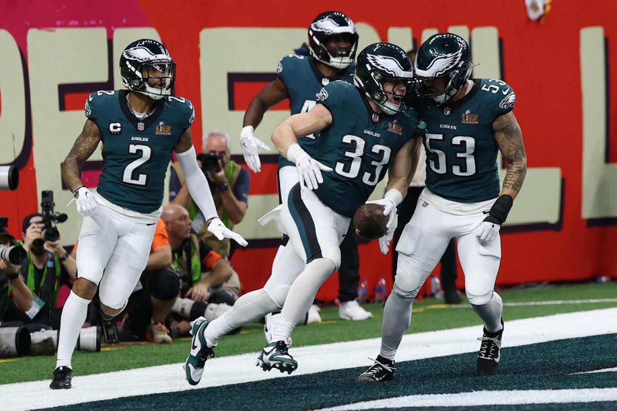 Feb 9, 2025; New Orleans, LA, USA; Philadelphia Eagles cornerback Cooper DeJean (33) celebrates with teammates after returning an interception for a touchdown against the Kansas City Chiefs during Super Bowl LIX at Caesars Superdome. 