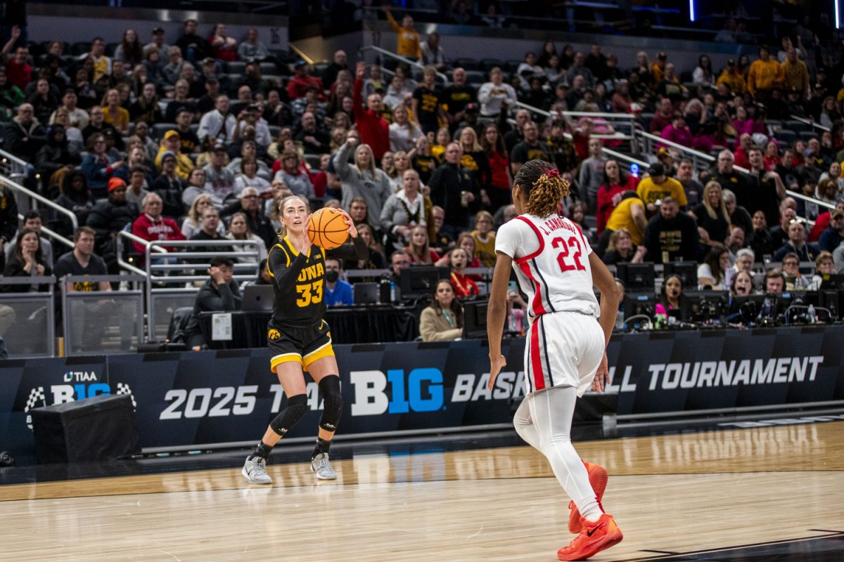 Iowa guard Lucy Olsen prepares to shoot a three-point shot during a basketball game between No. 11 Iowa and No. 3 Ohio State at the TIAA Big Ten Women’s Basketball Tournament at Gainbridge Fieldhouse in Indianapolis, Ind. on Friday, March 7, 2025. 
